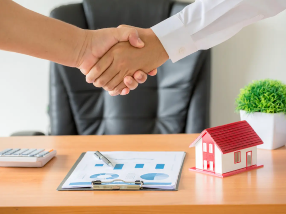 man shake hand and show trust as a trusted property dealer